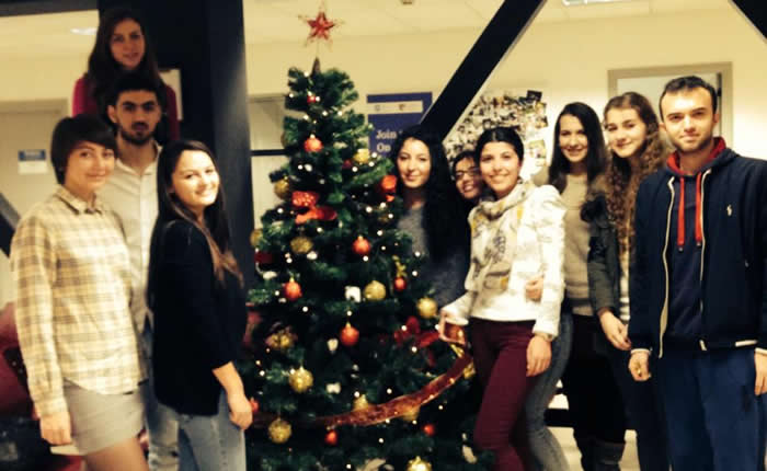 Marketing Club Students Decorate Christmas Tree