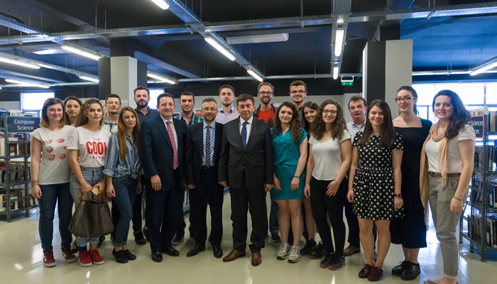 Prof. Dr. Arsim Bajrami, Minister of Education, Science and Technology of Kosovo with Mr Yannis Ververidis, Principal of the University of Sheffield International Faculty, CITY College with a group of Kosovar students.